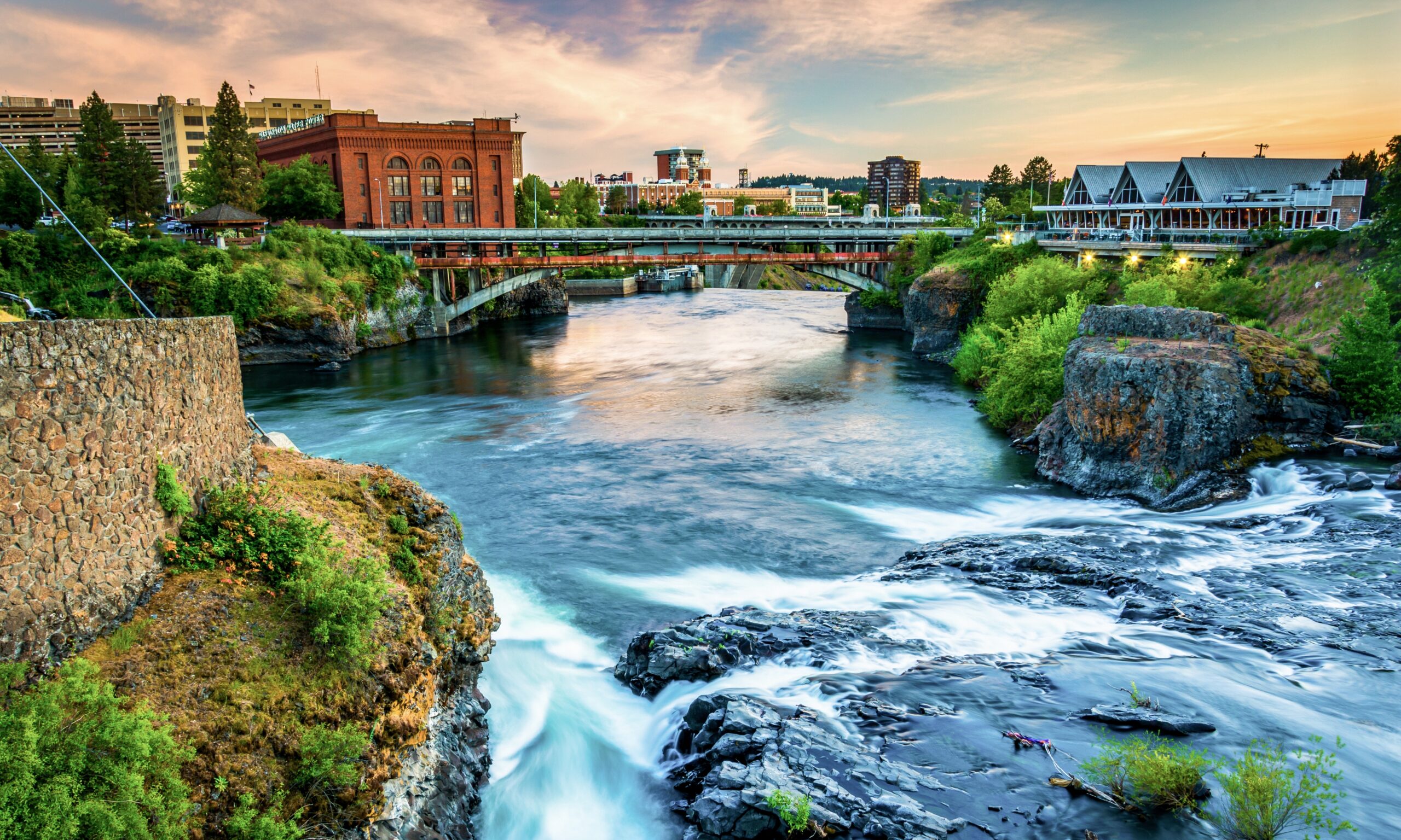 landscape photo of a bridge across the Spokane River